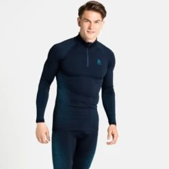 ODLO PERFORMANCE WARM ECO BL TOP TURTLE NECK L/S HALF ZIP DARK SAPPHIRE-STUNNING BLUE 22 -Ski Promotion Magasin 9 95552 bl top turtle neck l s half zip performa dark sapphire stunning blue 196222 20828 03